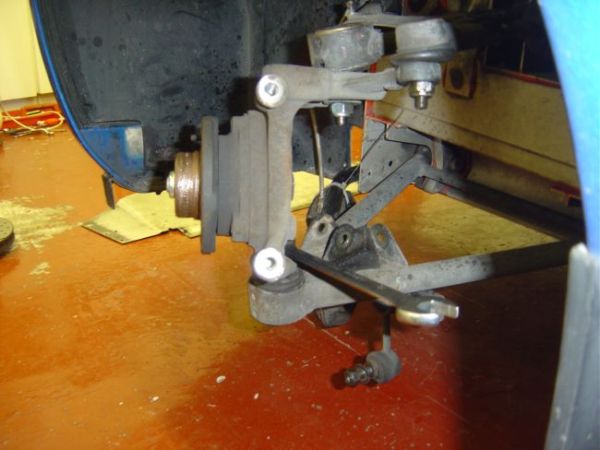 10 Remove Upper & Lower Ball Joint Nuts.JPG